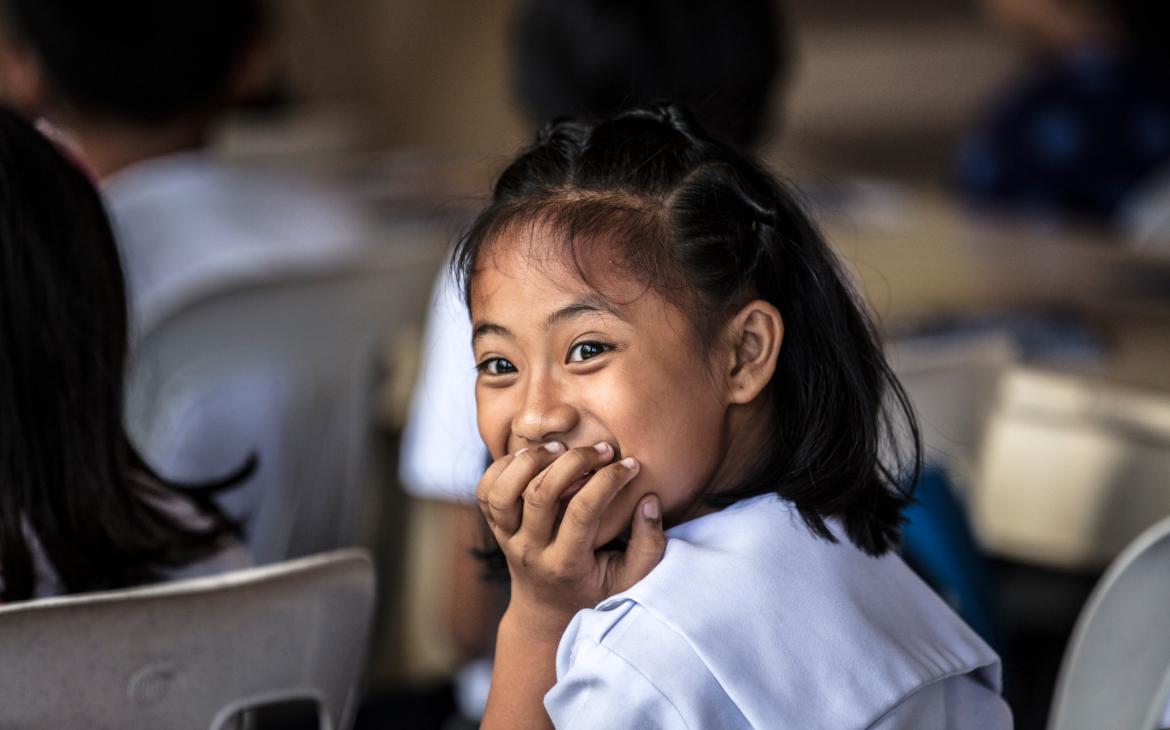 Ecolière dans le cadre d'un programme de sensibilisation à l'importance de l'écosystème marin, Donsol, Philippines